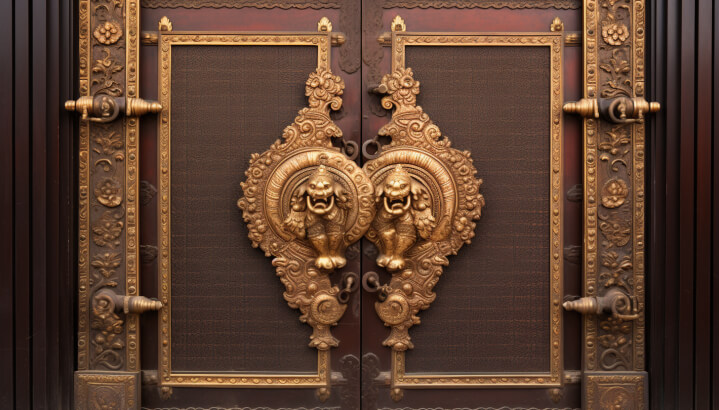 Main door with a Ganesh brass-inlaid design